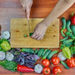 Woman mixing korean beet salad with mayonnaise - Creative Commons Bilder